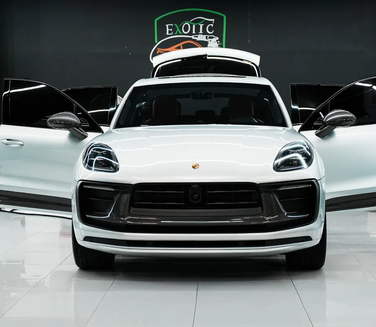 White Porsche Macan in for service at the Exotic Auto Services workshop in Abu Dhabi.