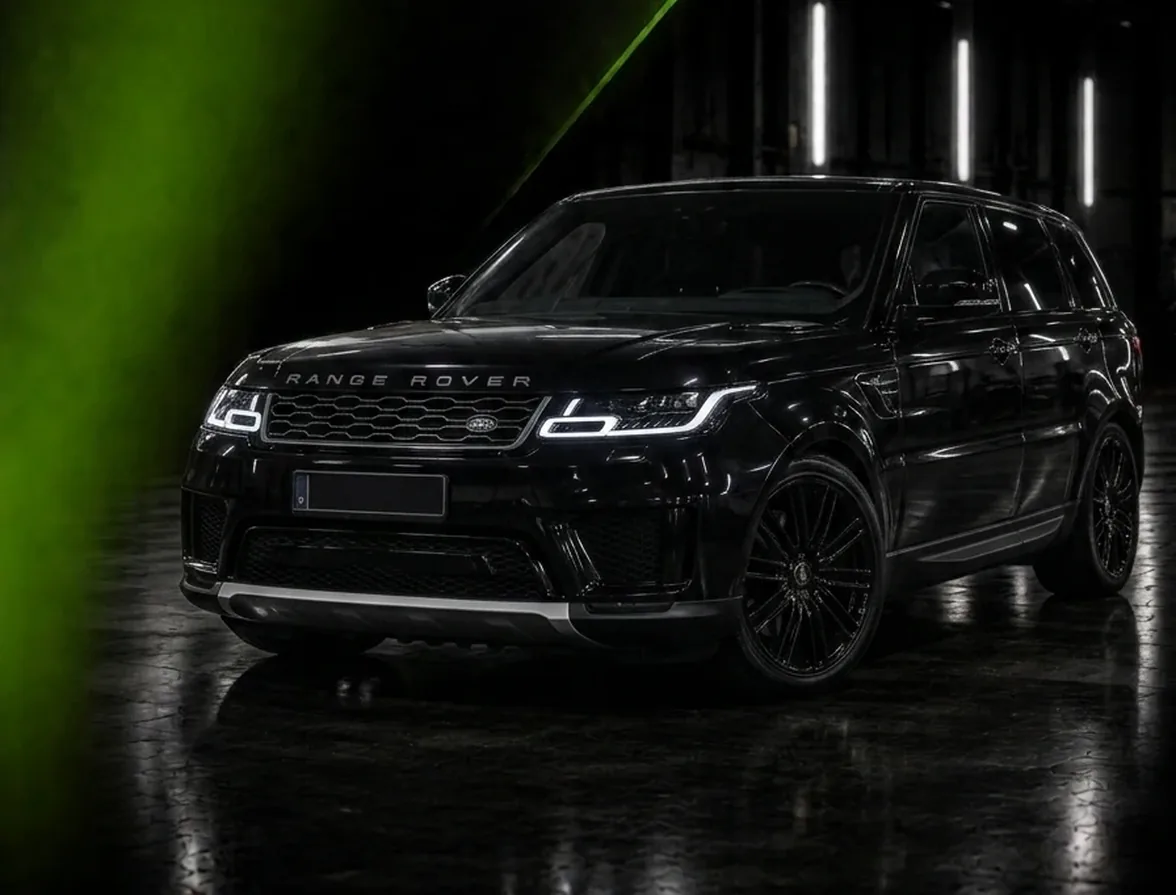 Black Range Rover lit inside the Exotic Auto Services workshop in Mussafah, Abu Dhabi