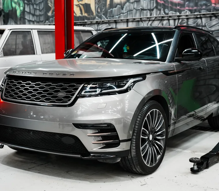 Silver Range Rover Velar in for service at the Exotic Auto Services workshop in Mussafah, Abu Dhabi.