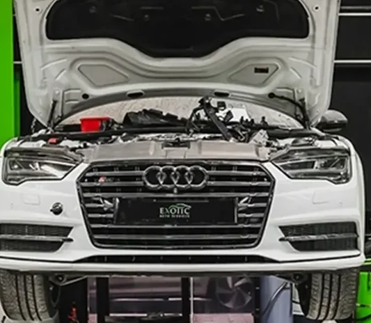 Body and paint repair completed at the Exotic Auto Services workshop in Abu Dhabi
