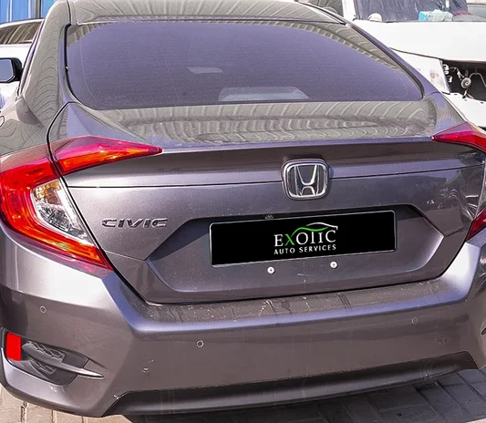 New car battery fitted and tested during a battery change in Abu Dhabi