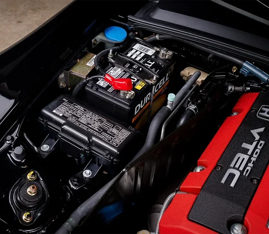 Car battery replacement carried out at the Exotic Auto Services workshop in Abu Dhabi