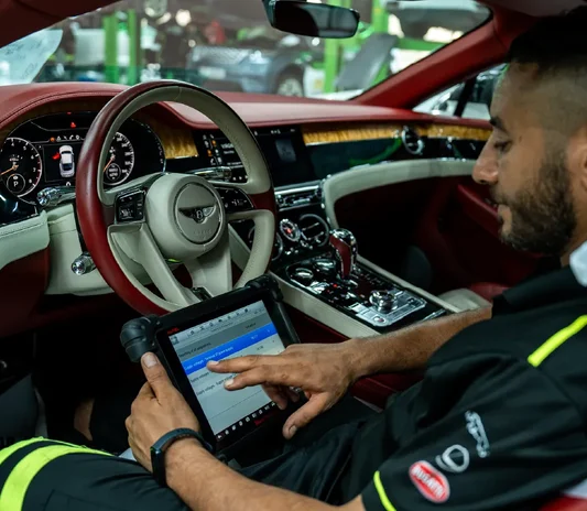 Car programming and key coding at the Mussafah workshop