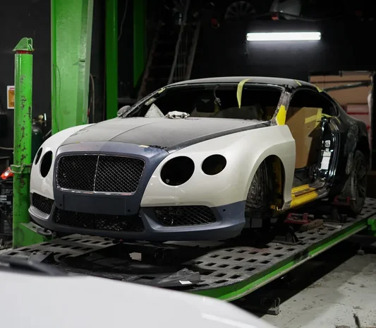 Bentley Continental GT prepared for body and paint work in Mussafah, Abu Dhabi