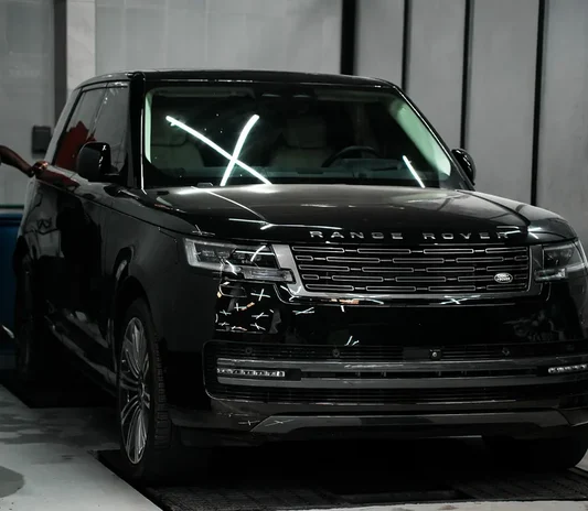 Range Rover prepared for paint work at the Exotic Auto Services workshop in Abu Dhabi