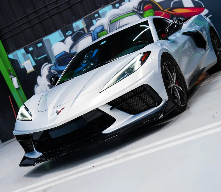 White Chevrolet Corvette C8 finished and ready for collection at Exotic Auto Services, Mussafah.