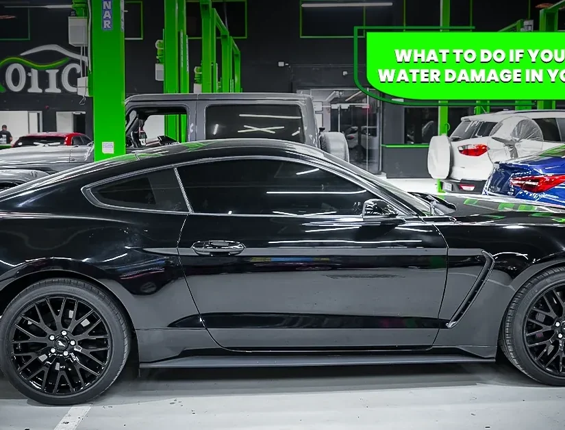 Flood-damaged luxury car undergoing water damage repair at the Exotic Auto Services workshop in Mussafah, Abu Dhabi