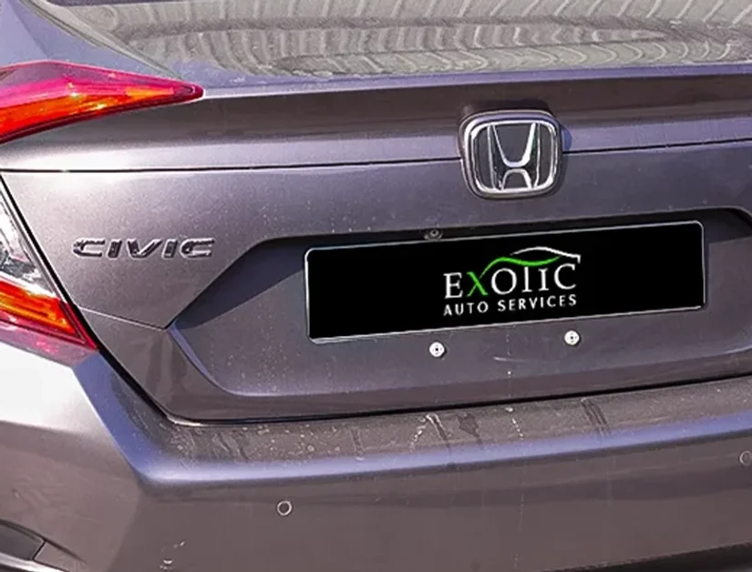 Honda Civic battery being replaced at the Exotic Auto Services workshop in Mussafah, Abu Dhabi