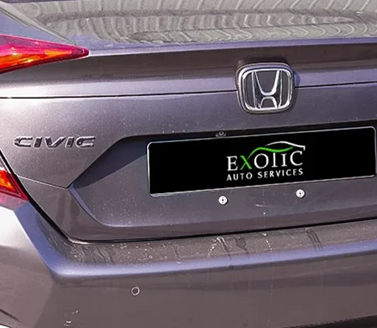 Honda Civic battery being replaced at the Exotic Auto Services workshop in Mussafah, Abu Dhabi