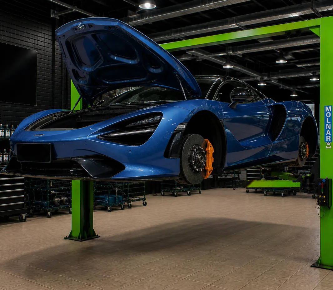 McLaren with the bonnet open for engine bay inspection in Mussafah, Abu Dhabi
