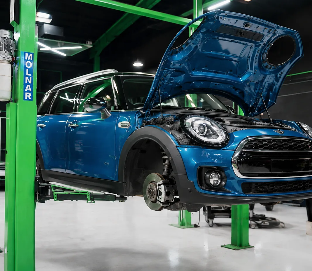 Mini Cooper with the bonnet open for engine bay inspection in Mussafah, Abu Dhabi