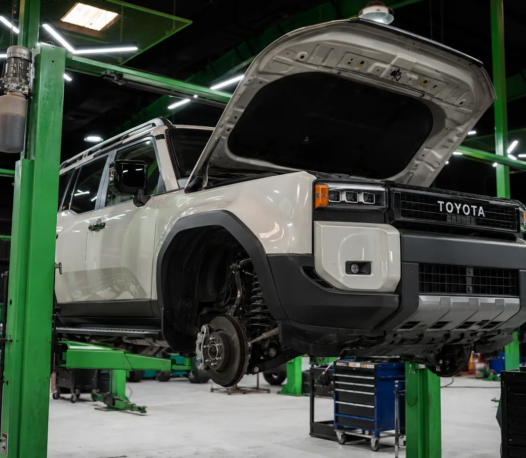 Prado with the bonnet open for engine bay inspection in Mussafah, Abu Dhabi