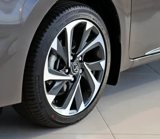 Alloy wheel fitted with rim protectors at the Exotic Auto Services workshop in Mussafah, Abu Dhabi