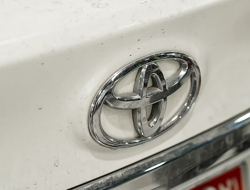 Toyota Camry on a ramp during a maintenance service at the Exotic Auto Services workshop in Mussafah, Abu Dhabi