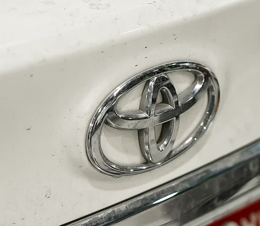 Toyota Camry on a ramp during maintenance at the Exotic Auto Services workshop in Mussafah, Abu Dhabi