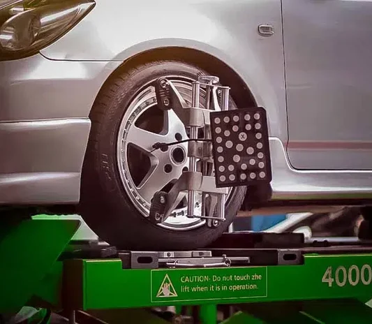 Alignment and balancing completed at the Exotic Auto Services workshop in Abu Dhabi
